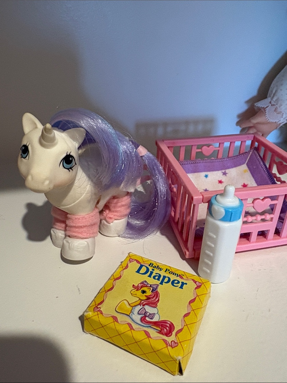 My Little Pony White Unicorn with Purple Mane and Pink Accessories. Baby. Crib.